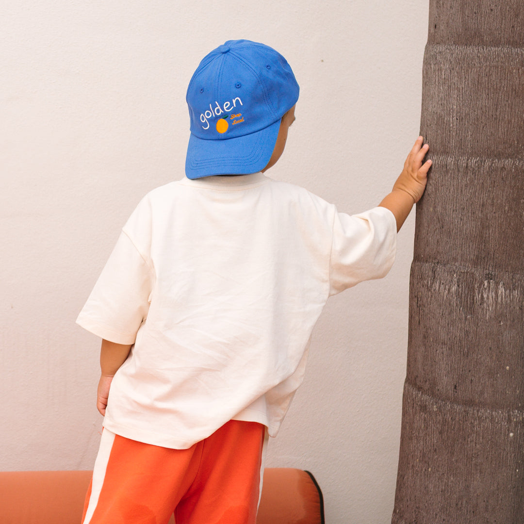 Golden Orange Cap Deep Sea Blue